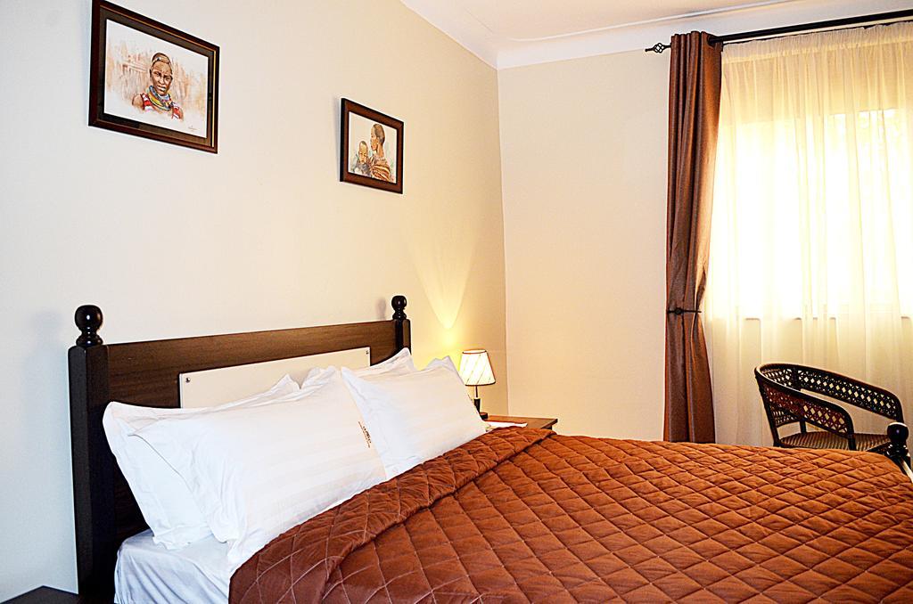 Marie'S Royale Hotel Kampala Szoba fotó